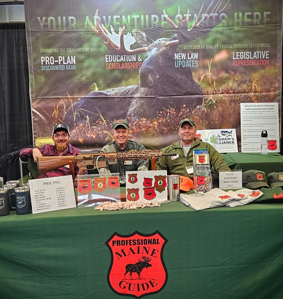 Maine Guides at a trade show booth
