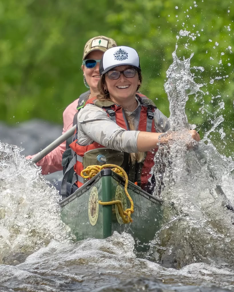 two maine canoeists enjoying exciting whitewater