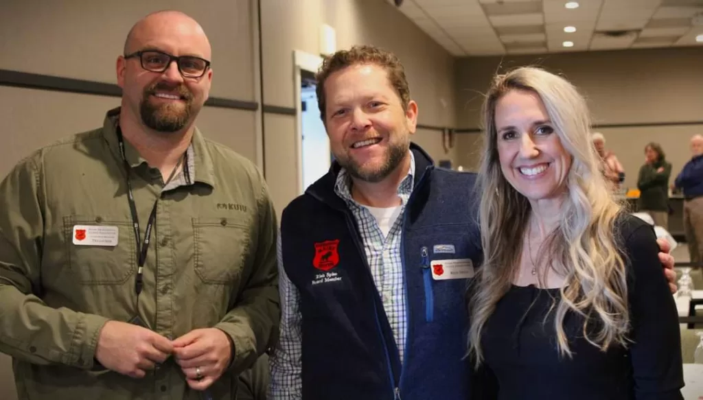 3 people smiling at MPGA tradeshow