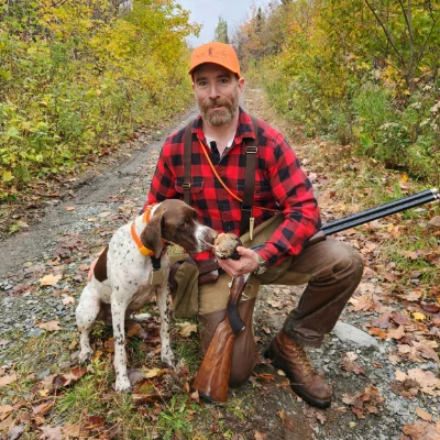 A hunter and his dog
